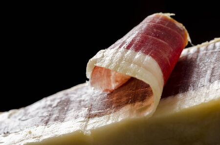 Detail of sliced iberian spanish, bellota ham. Gourmet spanish food.の写真素材