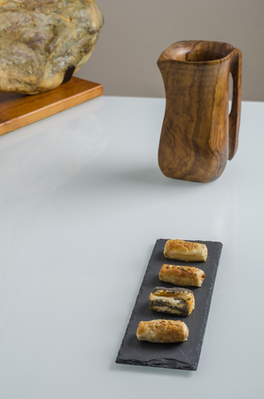 Paw of pig iberico, bellota ham and aperitif and olive pitcher.の写真素材