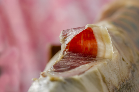 Cutting iberian spanish ham, bellota ham. Gourmet spanish food.の写真素材