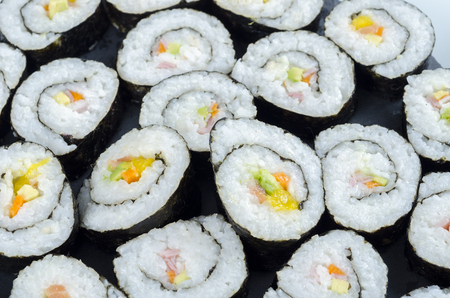 Maki sushi, rolls on slate plate.の写真素材