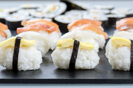 Sushi nigiri set on slate plate, close-up.の写真素材