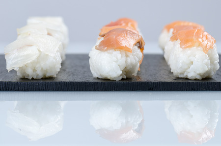 Sushi nigiri set on slate plate, close-up.の写真素材