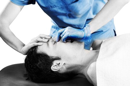 Physiotheraphist doing a sinus massage, theraphy.の写真素材