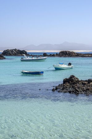 Boats in Lobos Island in Canary Islands, Spain.