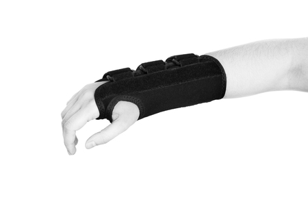 Patient is wearing a black wristband. in silhouette isolated on white background.の写真素材