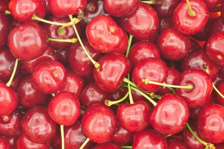 Cherry background. Healthy food concept. Photo texture. Top view
