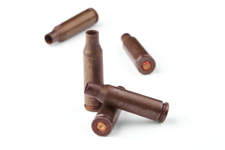 Five old cartridges on a white background