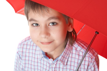 Boy with red umbrella, over white over white isolated over whiteの写真素材