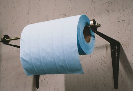 Toilet paper in common areas, paper towel for hand hygiene at work during coronavirusの写真素材