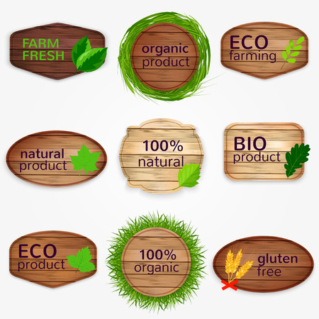 Wooden Eco labels , bages, stickers collection with green leaves and grass - Bio and natural product, natural, gluten free, organic product, farm fresh.のイラスト素材
