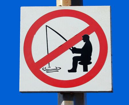 Sign Forbidden to fish in a port on Tenerife islandの写真素材