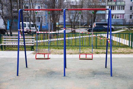 Moscow, Russia - April 26, 2020: The Playground is closed due to the coronavirus pandemic. Signal...