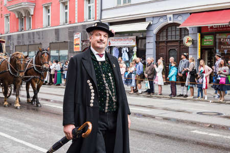 Munich, Germany - September 24, 2018: Participants of the parade at the German beer festival Oktoberfest in historical costume posing for the camera.のeditorial素材