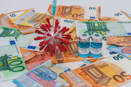 Concept for economy, finance, budget, investment and business, New year 2021, Covid-19 vaccination over the world, Euro banknotesの写真素材