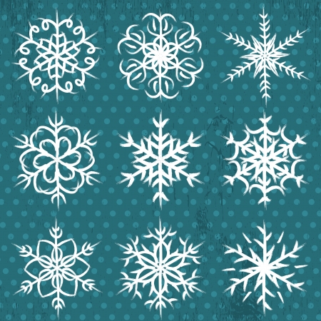 hand made snowflakes on blue backgroundのイラスト素材
