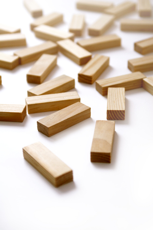Wooden rectangles arranged differently over a white background. Copy space. Cover background template for the presentation, brochure, web, banner, catalog, poster, book, magazineの写真素材
