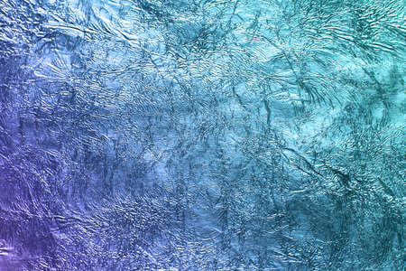 Shiny leaf blue foil wrinkled background suitable for any graphic design, poster, website, banner, greeting card, backgroundの写真素材