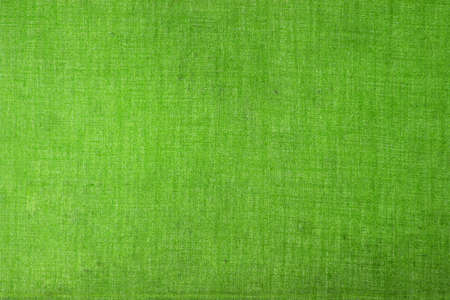 Green vintage plain fabric background suitable for any graphic design, poster, website, banner, greeting card, backgroundの写真素材
