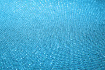 Blue texture with shiny gold dots. Focus in the center and blur at both ends. Flat lay mockup design. Texture sheet abstract background, wrapping texture.の写真素材