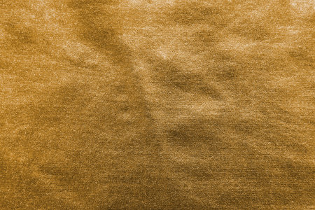 Gold texture background. Abstract cloth of gold. Flat design mockup. Abstract golden texture.の写真素材