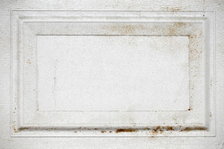 Rusted white metal frame