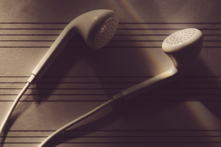 Earphones on the sheet music