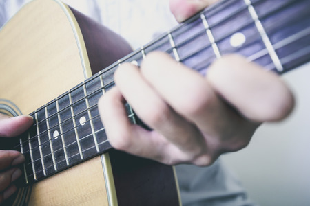Playing Acoustic guitarの写真素材