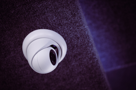 Modern Security Camera on the Ceilingの写真素材