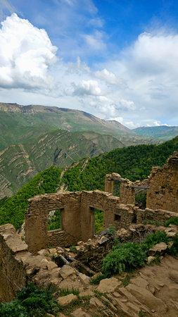 Ruins of the ancient fortress in the mountains of the Caucasus.の写真素材