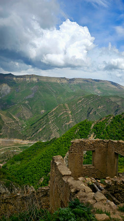 Ruins of the ancient fortress in the mountains of the Caucasus.の写真素材