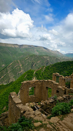 Ruins of an ancient fortress in the Caucasus mountains, Georgia.の写真素材