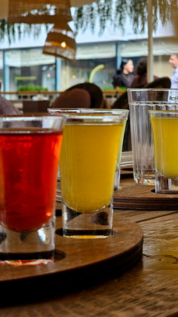 Molecular Mixology Cocktails with Smoke Effect
Description: Innovative molecular cocktails featuring smoke-filled glass domes, caviar pearls and foams in laboratory-style glasswareの写真素材