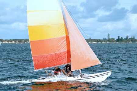 Children sailing activities at Belmont 16ft sailing Club . Lake Macquarie, New South Wales, Australia.の写真素材