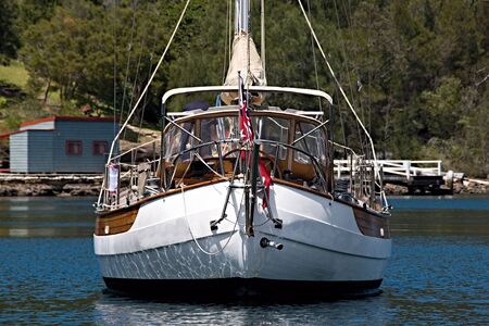 A blue water sailing yacht moored in the protected waters of Bantry Bay, Middle Harbour, Sydney, October 2013.の写真素材