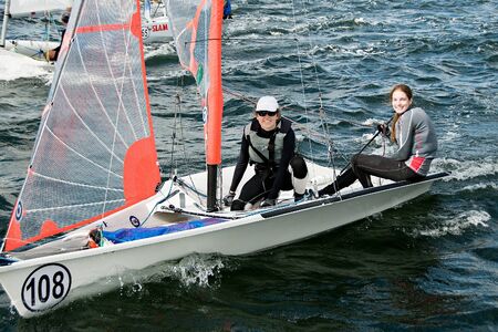 Children competing in the Australian Combined High School Sailing Championships 2013. Lake Macquarie. Australia. Young contestants raced in various types of dinghies.のeditorial素材