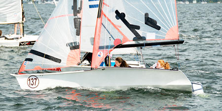 Lake Macquarie, Australia - April 16. 2013: Children competing in the Australian Combined High School Sailing Championships. Young contestants raced in various types of dinghies.のeditorial素材