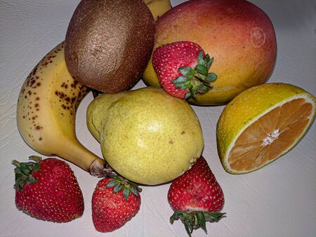 Food Platter. Colourful mixed fresh fruit strawberries and other on white.の写真素材