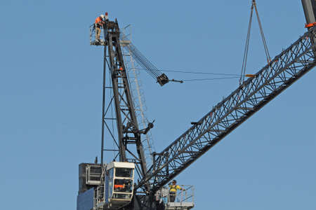 Gosford, New South Wales, Australia - May 11, 2019: High rise building under construction. Assembly of the Sky Crane day four.のeditorial素材
