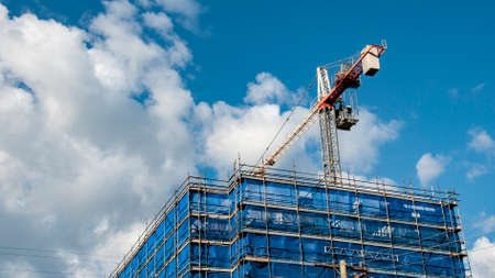 Gosford, New South Wales, Australia - September 7. 2018: Construction and building progress update 133.  A working tower crane on new home units building site at 47 Beane St.のeditorial素材