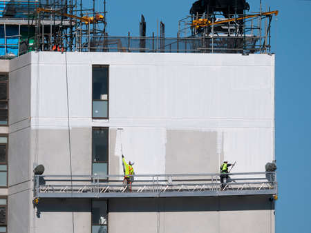 Building work series, progress on the new high rise apartments construction at 277 Mann St, with a Work platform hoist on the structure. External view. Commercial use image. Gosford, Australiaの写真素材