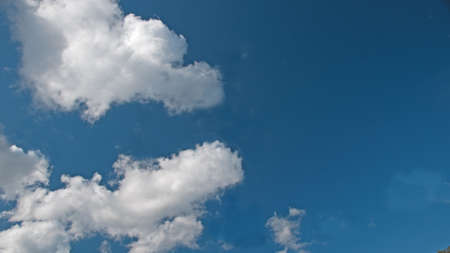 Nephology at its best. A beautiful meteorological sky cloudscape scene, with white  Cumulus cloud formation in a mid blue sky. Atmospheric beauty in nature. New South Wales, Australia.の写真素材