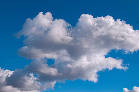 Nephology at its best. A beautiful meteorological sky cloudscape scene, with white fluffy Cumulus cloud in a mid blue sky. Atmospheric beauty in nature. New South Wales, Australia.の写真素材