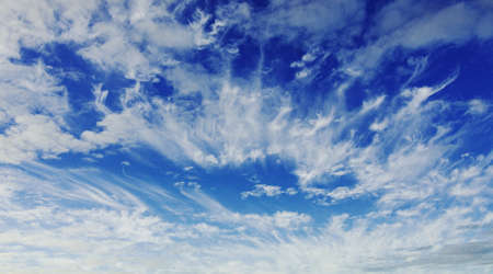 A beautiful vibrant meteorological sky cloudscape scene, with white Cumulus  cloud formation in a vivid blue sky. Atmospheric beauty in nature. New South Wales, Australia.の写真素材