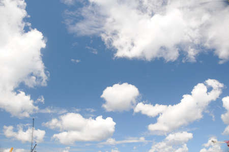 Nephology at its best. A beautiful meteorological sky cloudscape scene, with white Cumulus cloud formation in a mid blue sky. Atmospheric beauty in nature. New South Wales, Australia.の写真素材
