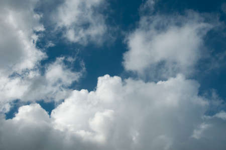 Nephology at its best. A beautiful meteorological sky cloudscape scene, with white Cumulonimbus cloud formation in a mid blue sky. Atmospheric beauty in nature. New South Wales, Australia.の写真素材