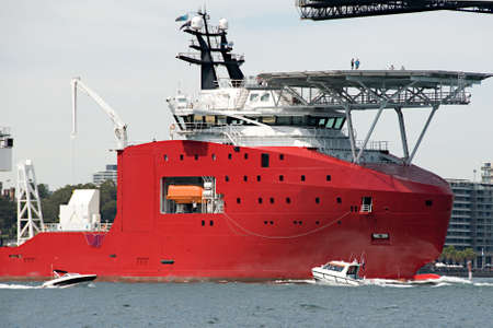 A 106 meter Transport Support and Rescue Ship with helipad, closeup starboard view at Sydney navy centenary celebrations. Australia.の写真素材