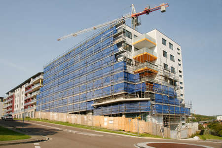 Gosford, New South Wales, Australia - March 5, 2019:  A perspective view of a working tower crane on new home units building site at 47 Beane St.  Update 196.のeditorial素材