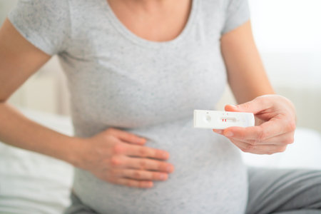 Future mother reviewing polymerase chain reaction test findings. Essential infectious disease monitoring for pregnancy wellness.の写真素材