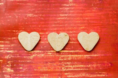 heart shaped cookies on blue backgroundの写真素材