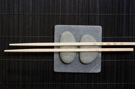 Asia still life with chopstick and pebbleの写真素材